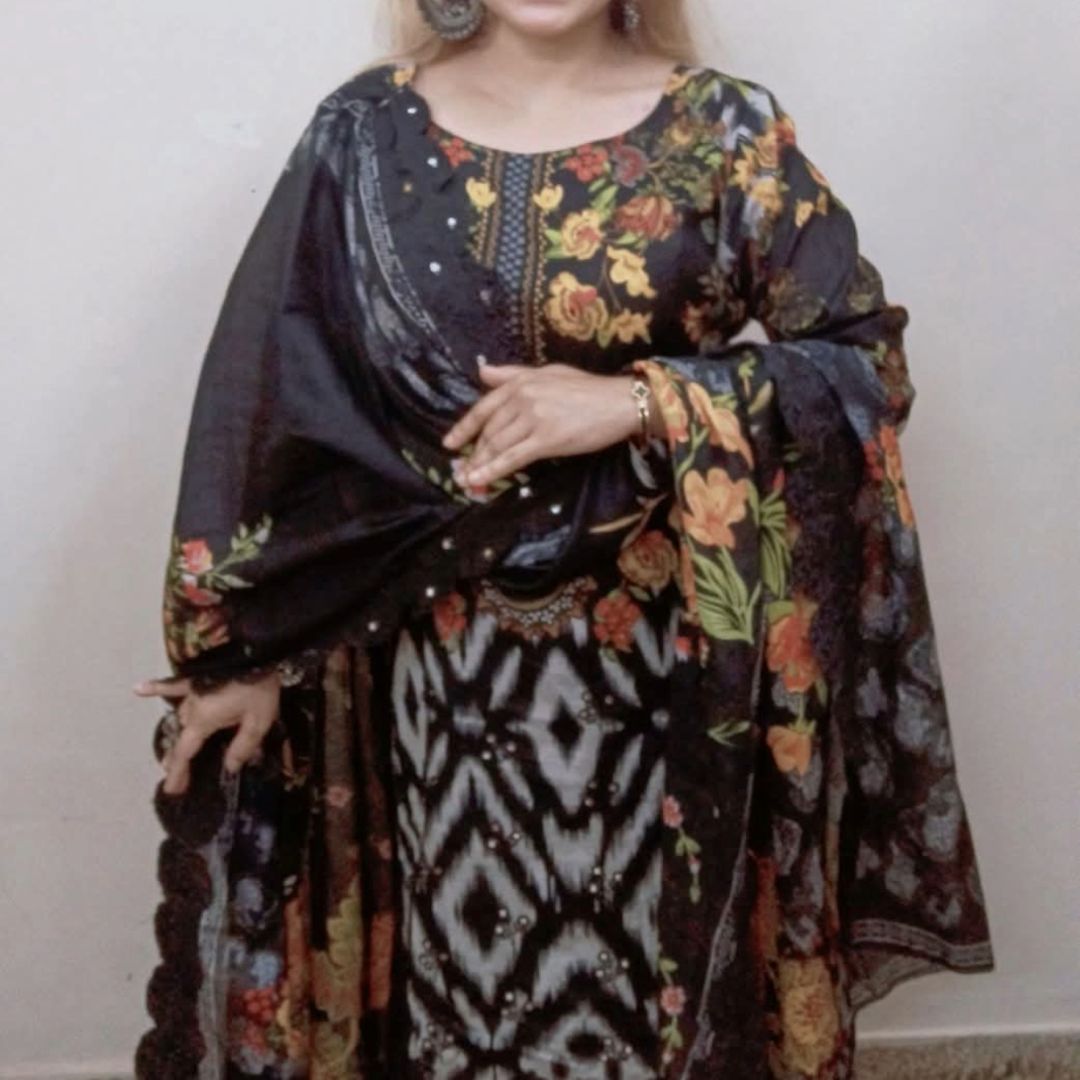 elegant floral and ikat inspired prints on a dark black base elegant floral and ikat inspired prints on a dark black base