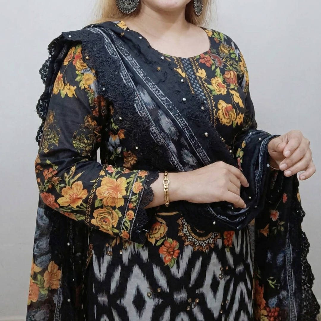 elegant floral and ikat inspired prints on a dark black base elegant floral and ikat inspired prints on a dark black base